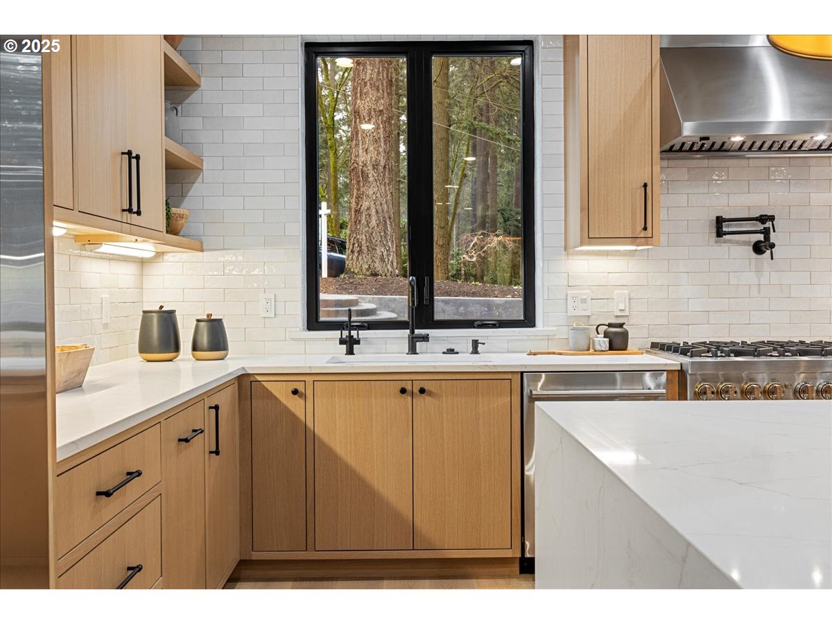 1572 Chandler Road Lake Oswego, OR 97034 - Photo 11 of 47 a kitchen with a sink window and cabinets