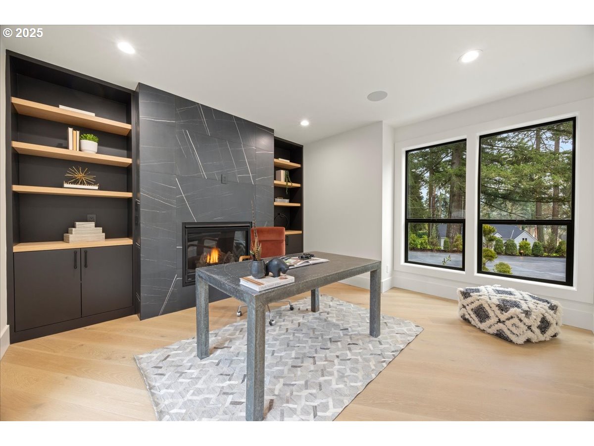 1572 Chandler Road Lake Oswego, OR 97034 - Photo 20 of 47 a living room with furniture a window and a fireplace