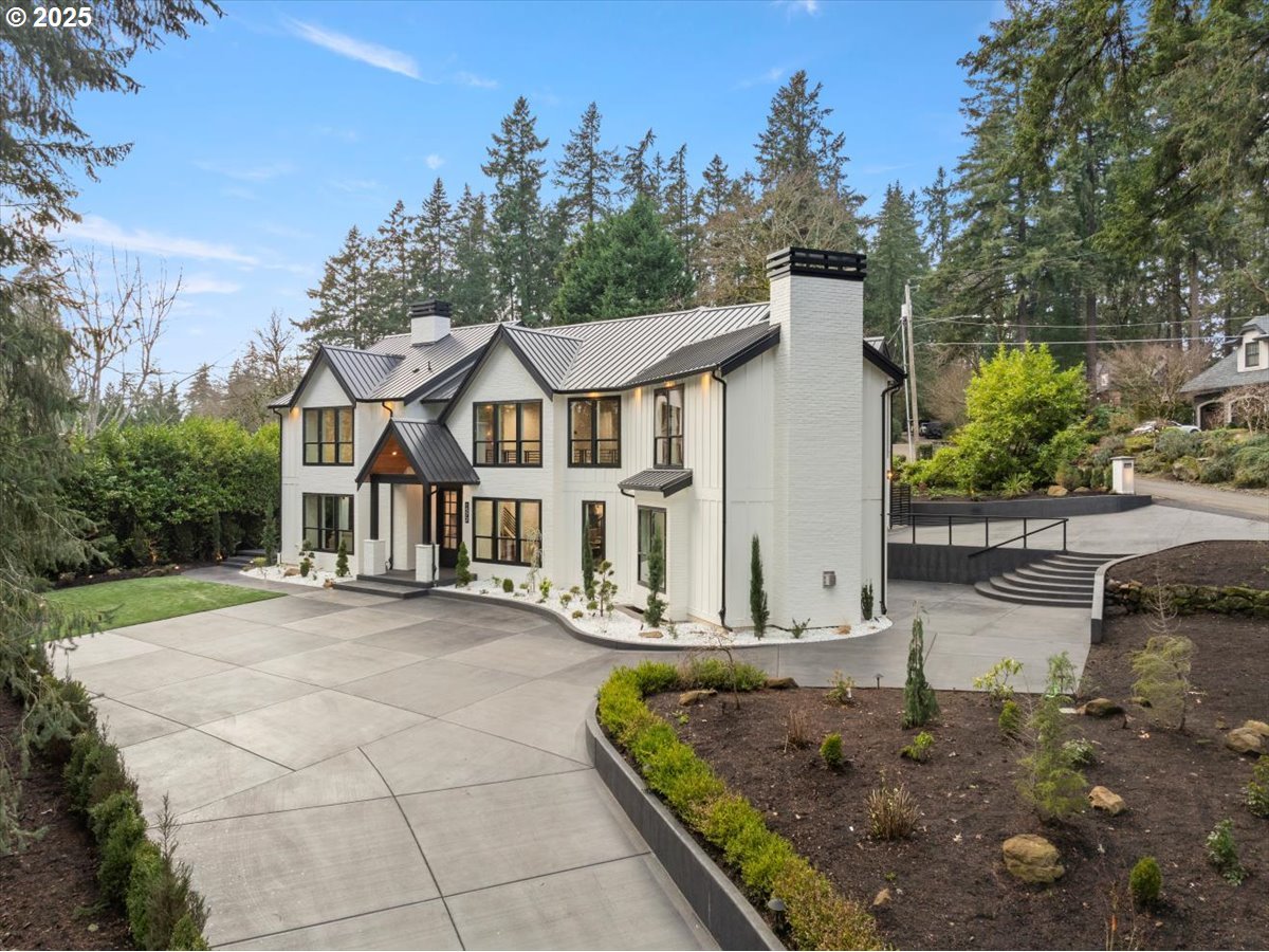 1572 Chandler Road Lake Oswego, OR 97034 - Photo 2 of 47 a front view of a house with a yard