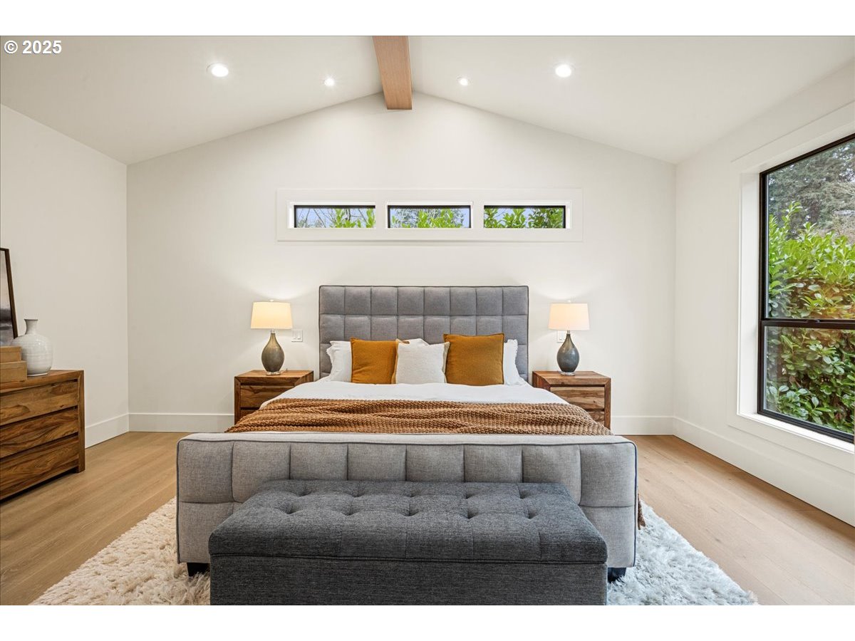 1572 Chandler Road Lake Oswego, OR 97034 - Photo 23 of 47 a bedroom with a bed and window