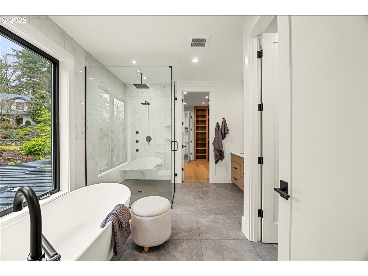 1572 Chandler Road Lake Oswego, OR 97034 - Photo 26 of 47 a bathroom with a bathtub shower sink and toilet