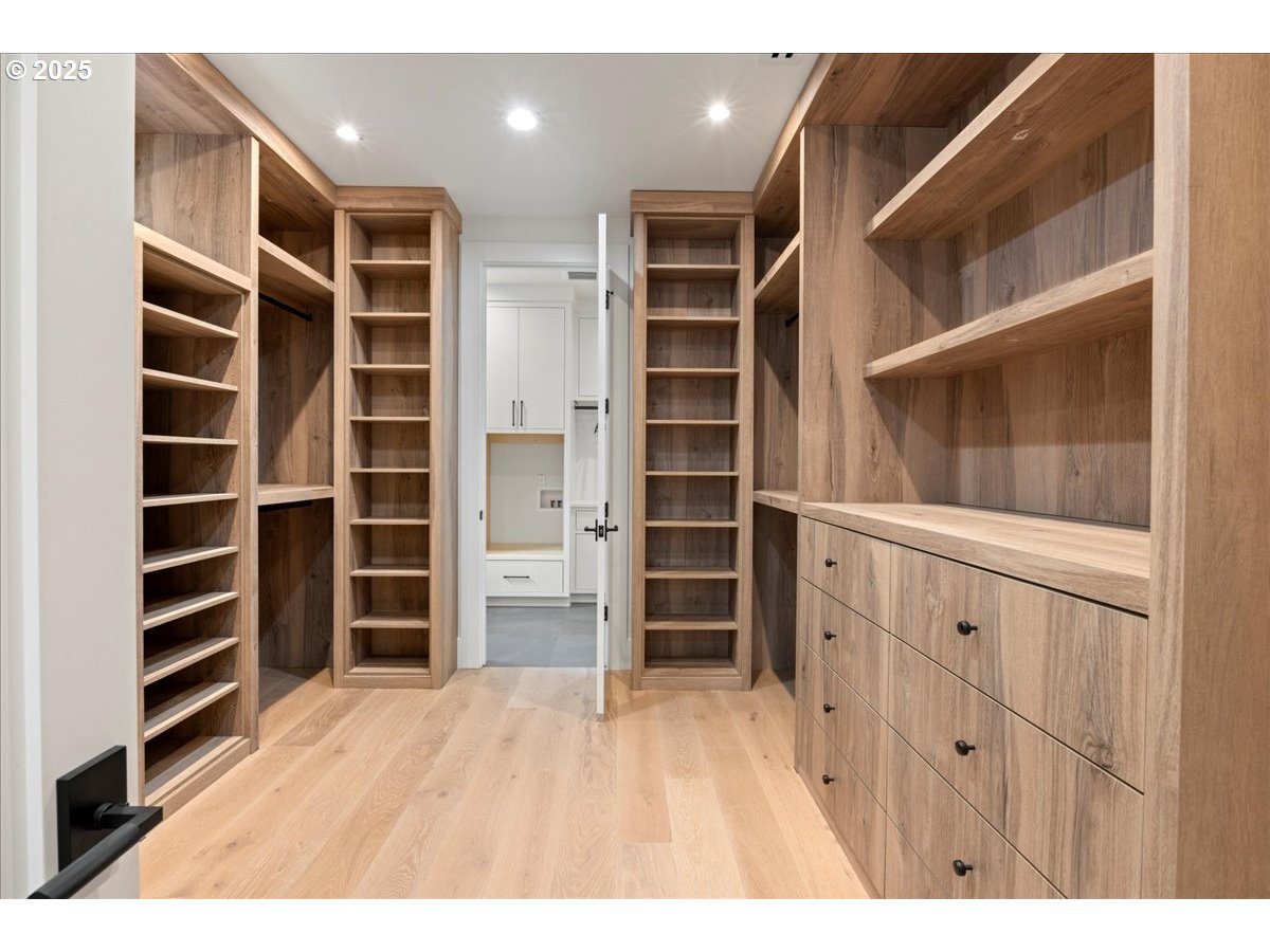 1572 Chandler Road Lake Oswego, OR 97034 - Photo 29 of 47 a view of walk in closet with empty racks