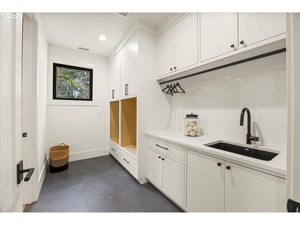 1572 Chandler Road Lake Oswego, OR 97034 - Photo 31 of 47 a kitchen with sink and cabinets