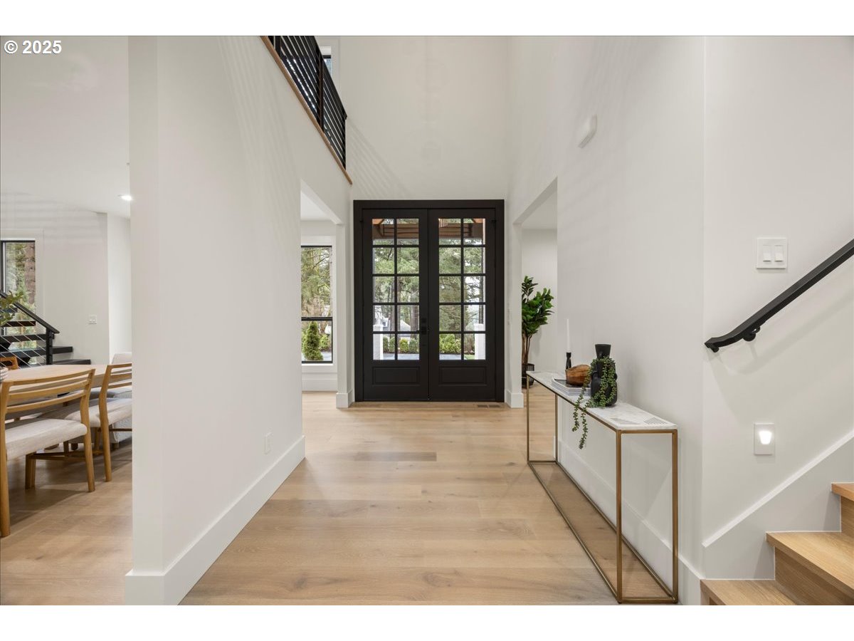 1572 Chandler Road Lake Oswego, OR 97034 - Photo 4 of 47 a view interior of a house with wooden floor and windows