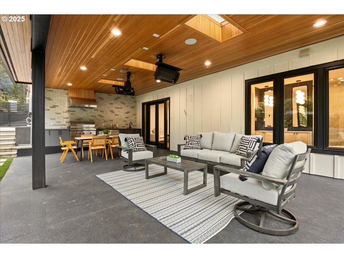 1572 Chandler Road Lake Oswego, OR 97034 - Photo 43 of 47 a living room with furniture and a table