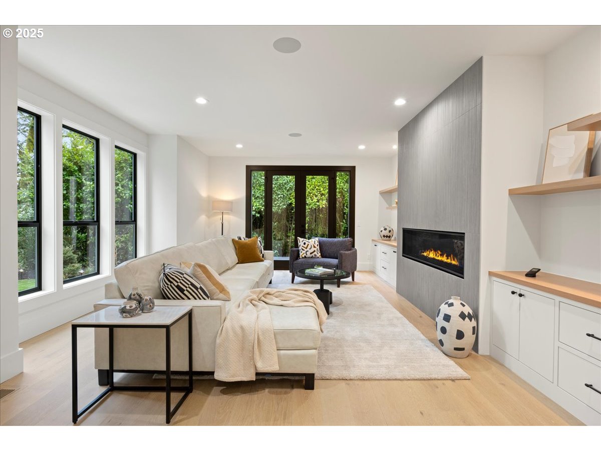 1572 Chandler Road Lake Oswego, OR 97034 - Photo 6 of 47 a living room with furniture and a large window