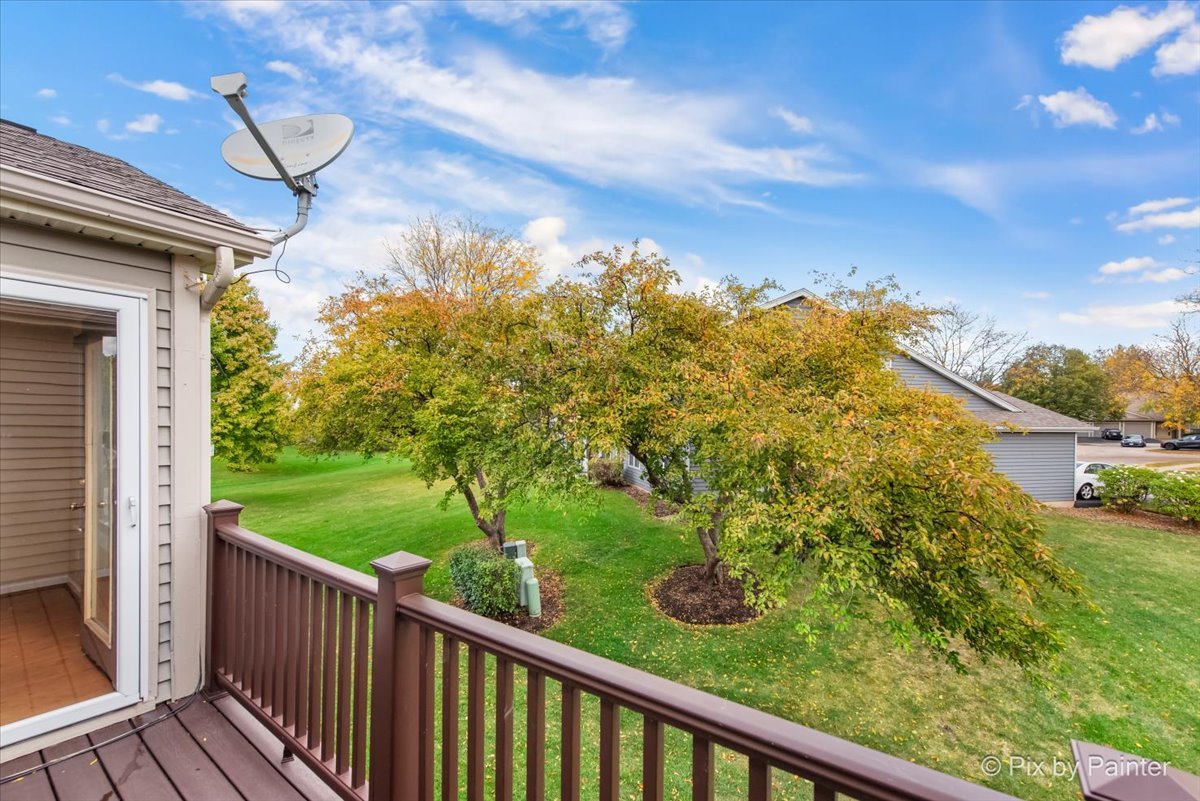 1023 Berkshire Court, Unit C Elgin, IL 60120 - Photo 15 of 54 a view of a balcony with an outdoor space