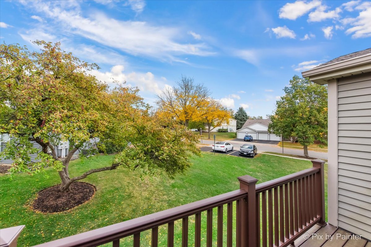 1023 Berkshire Court, Unit C Elgin, IL 60120 - Photo 16 of 54 a view of a porch with a yard