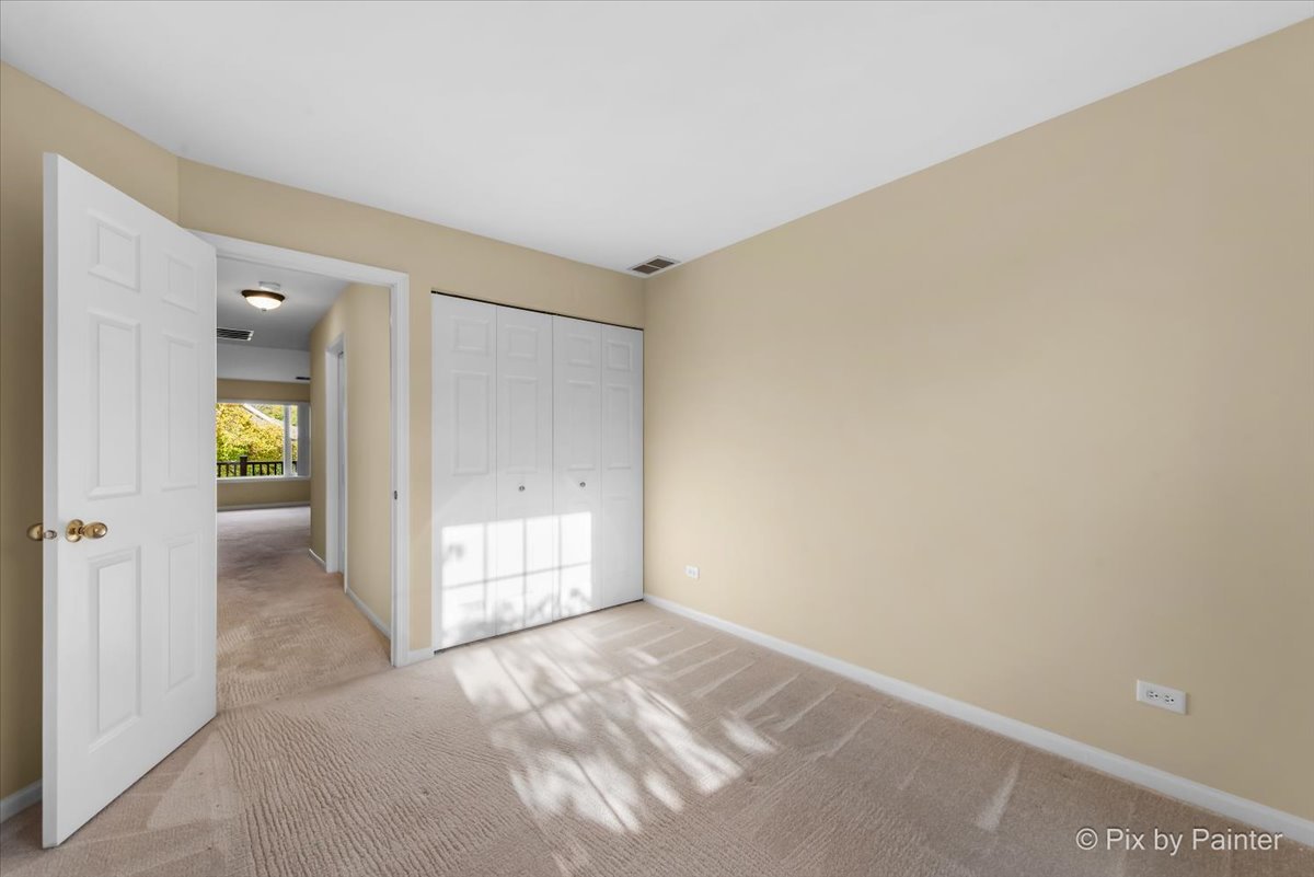 1023 Berkshire Court, Unit C Elgin, IL 60120 - Photo 23 of 54 a view of an empty room