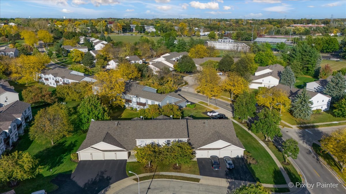 1023 Berkshire Court, Unit C Elgin, IL 60120 - Photo 42 of 54 an aerial view of a house with a lake view