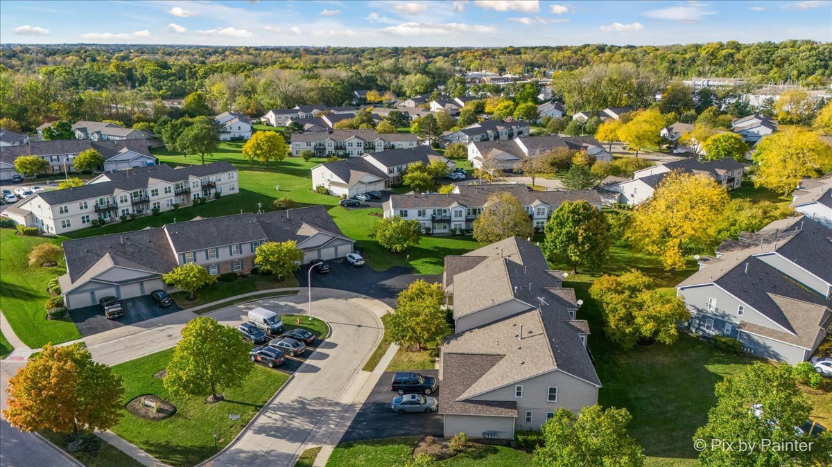 1023 Berkshire Court, Unit C Elgin, IL 60120 - Photo 43 of 54 an aerial view of residential houses with outdoor space