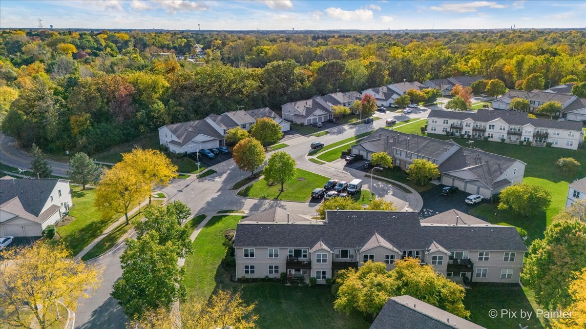1023 Berkshire Court, Unit C Elgin, IL 60120 - Photo 44 of 54 an aerial view of houses with yard