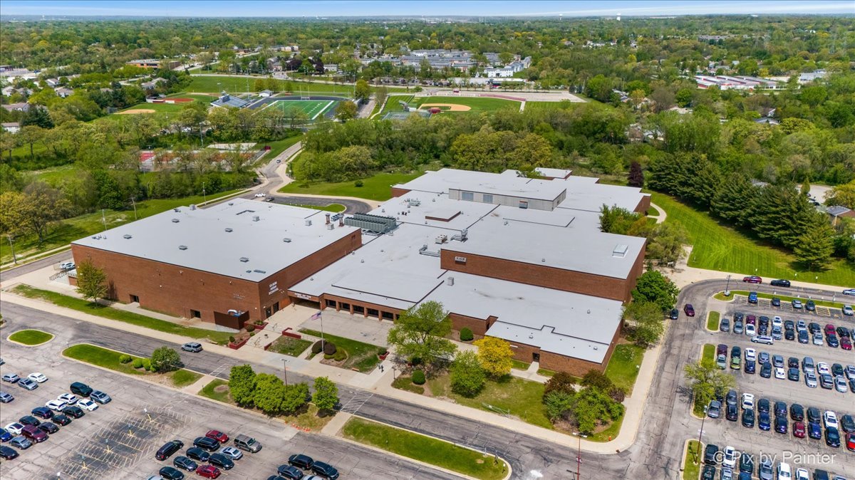 1023 Berkshire Court, Unit C Elgin, IL 60120 - Photo 47 of 54 an aerial view of a city with lots of residential buildings