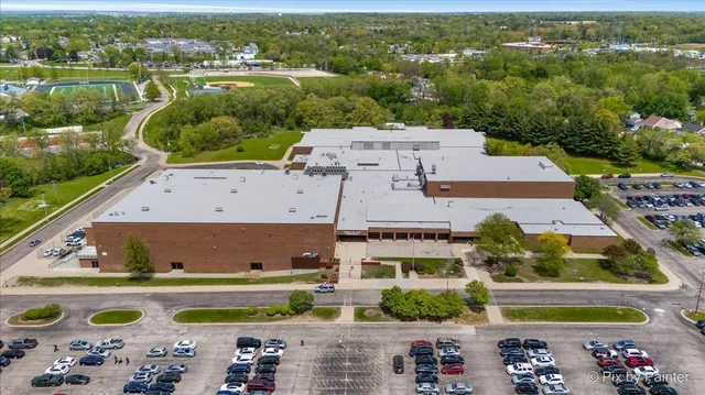 a view of a swimming pool with a patio