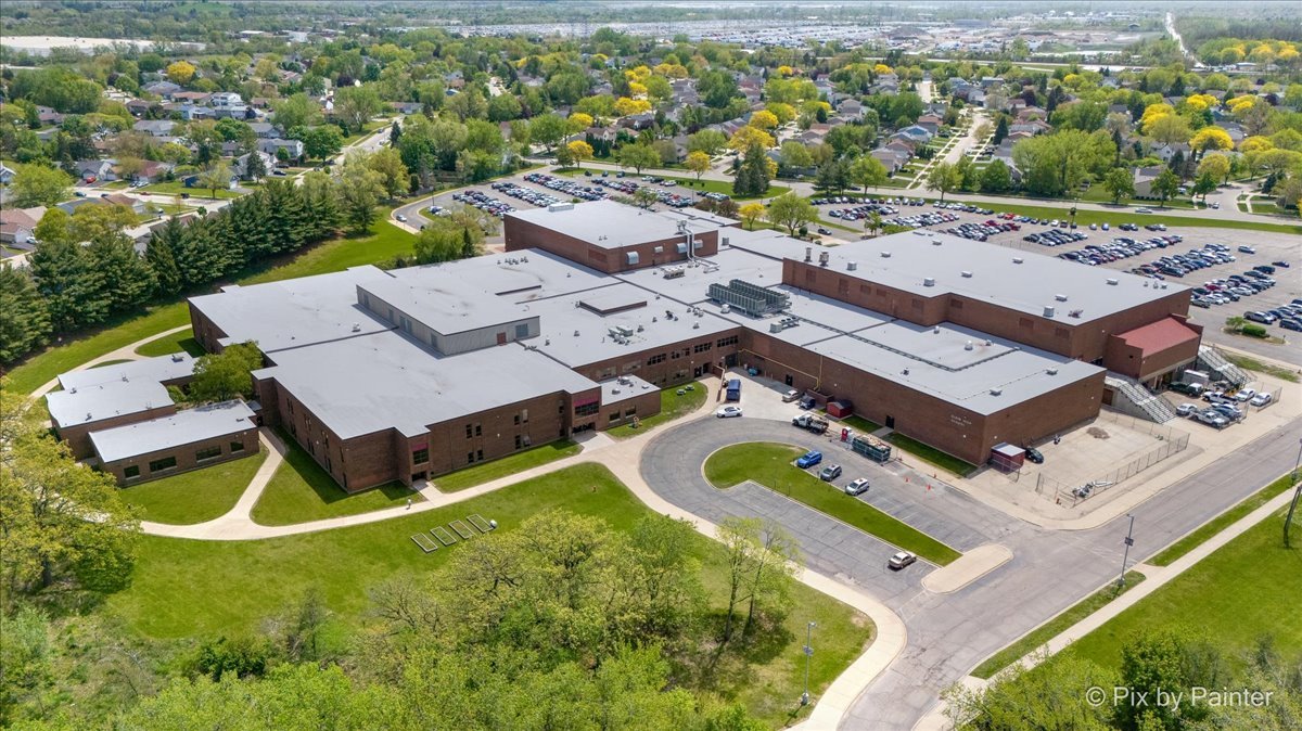 1023 Berkshire Court, Unit C Elgin, IL 60120 - Photo 49 of 54 an aerial view of a house with a big yard