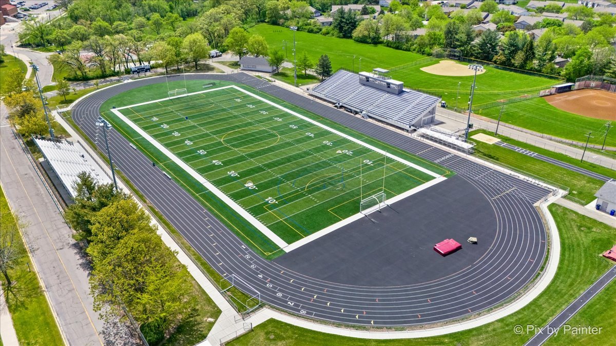 1023 Berkshire Court, Unit C Elgin, IL 60120 - Photo 51 of 54 a view of a swimming pool with a patio