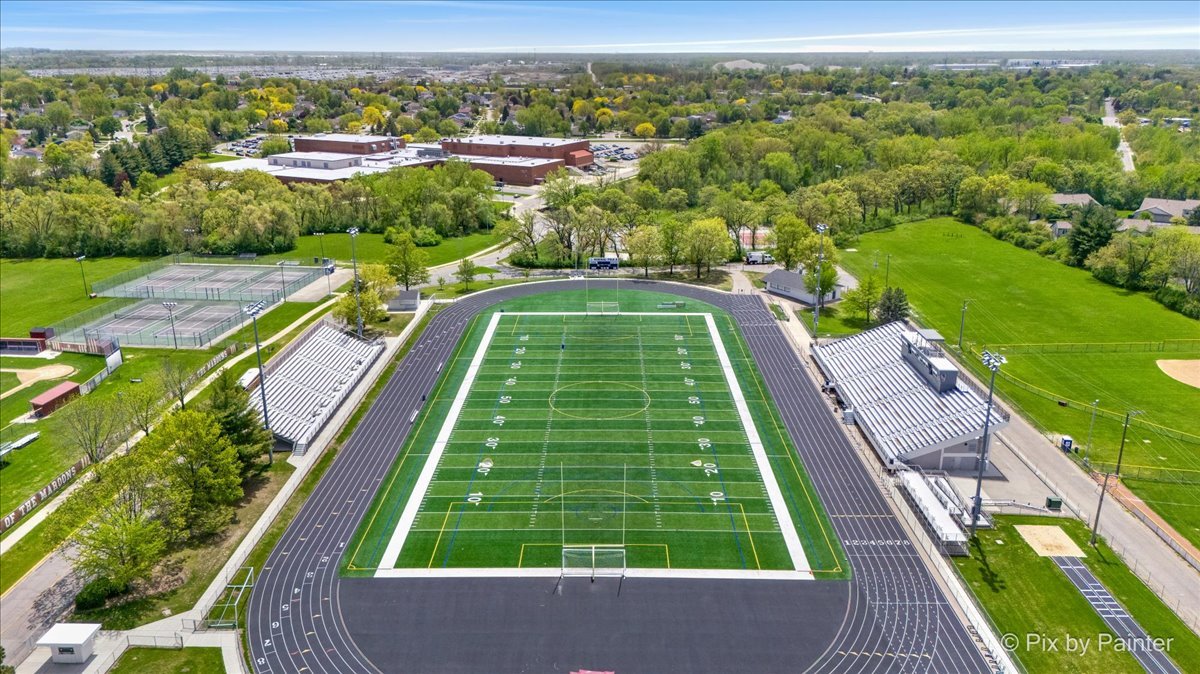 1023 Berkshire Court, Unit C Elgin, IL 60120 - Photo 52 of 54 a view of yard with swimming pool