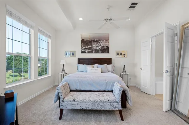 a bedroom with a bed and a walk in closet