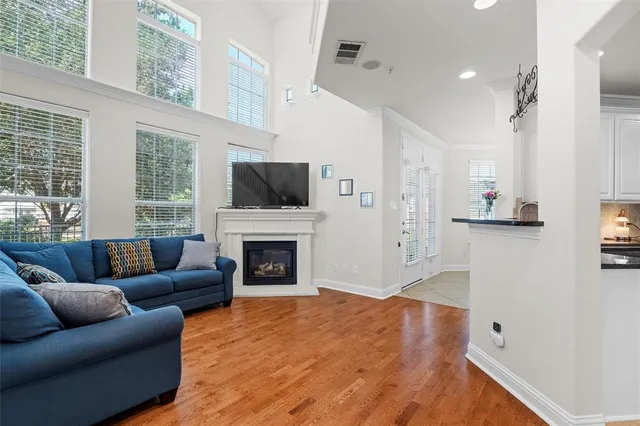 a view of a dining room with furniture and window