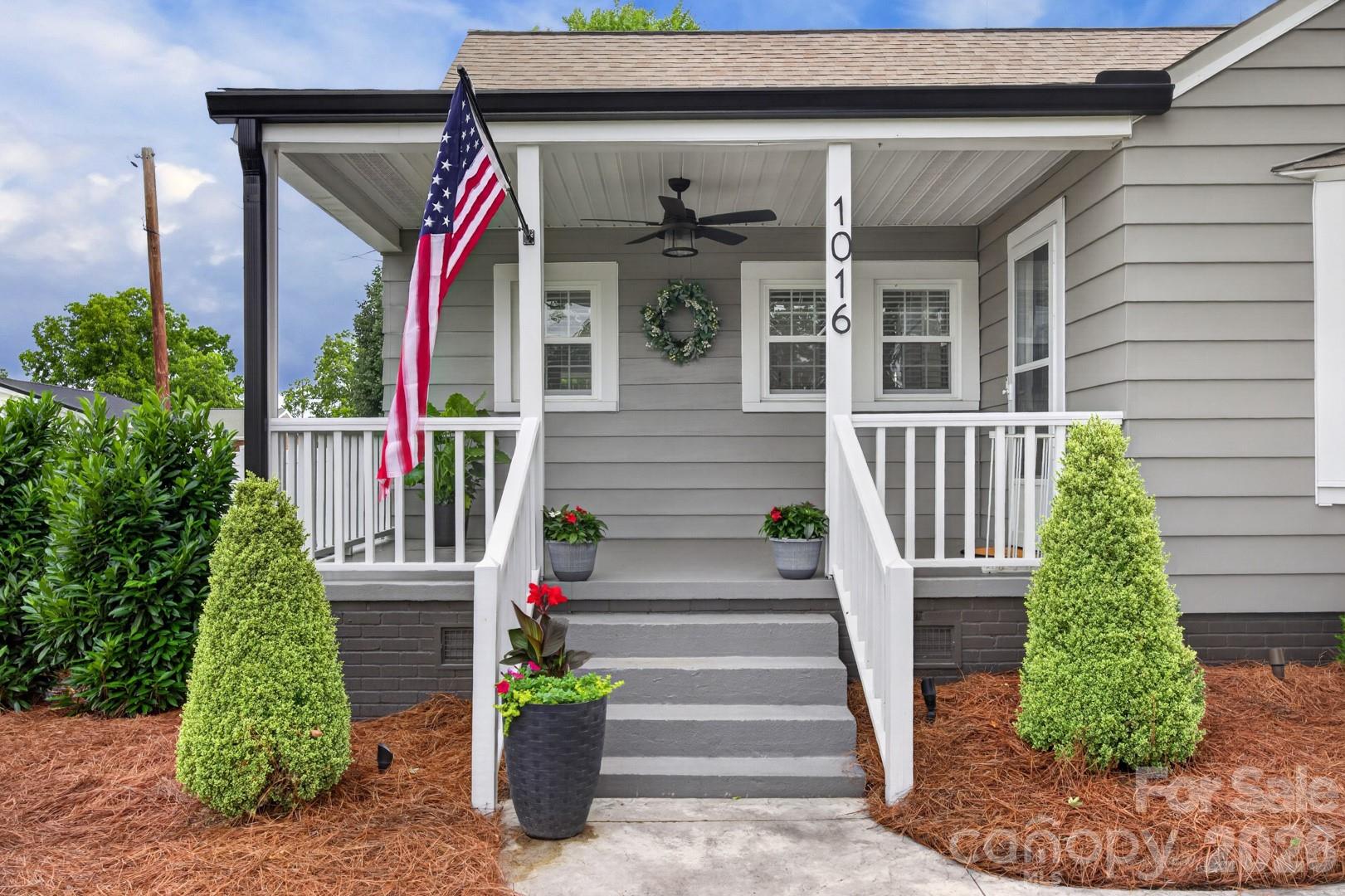 1016 Raney Street Salisbury, NC 28146 - Photo 5 of 45 a view of a house with plants and door