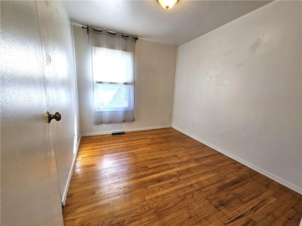 57 Old York Road Washington, PA 15301 - Photo 13 of 25 a view of empty room with wooden floor and fan