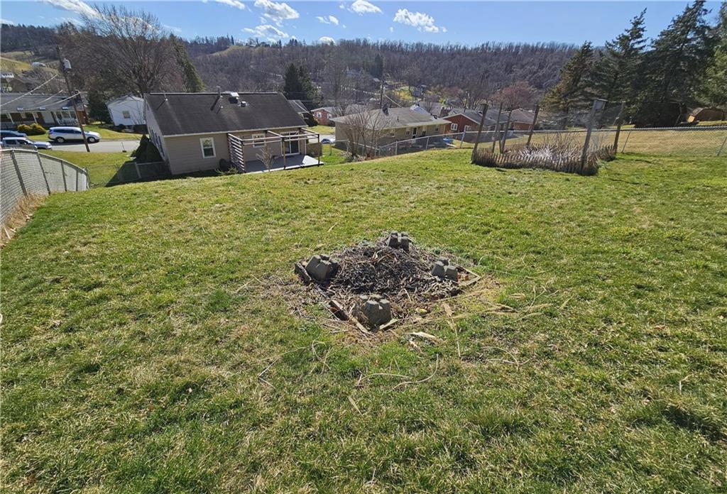 57 Old York Road Washington, PA 15301 - Photo 24 of 25 a view of a garden with a building in the background