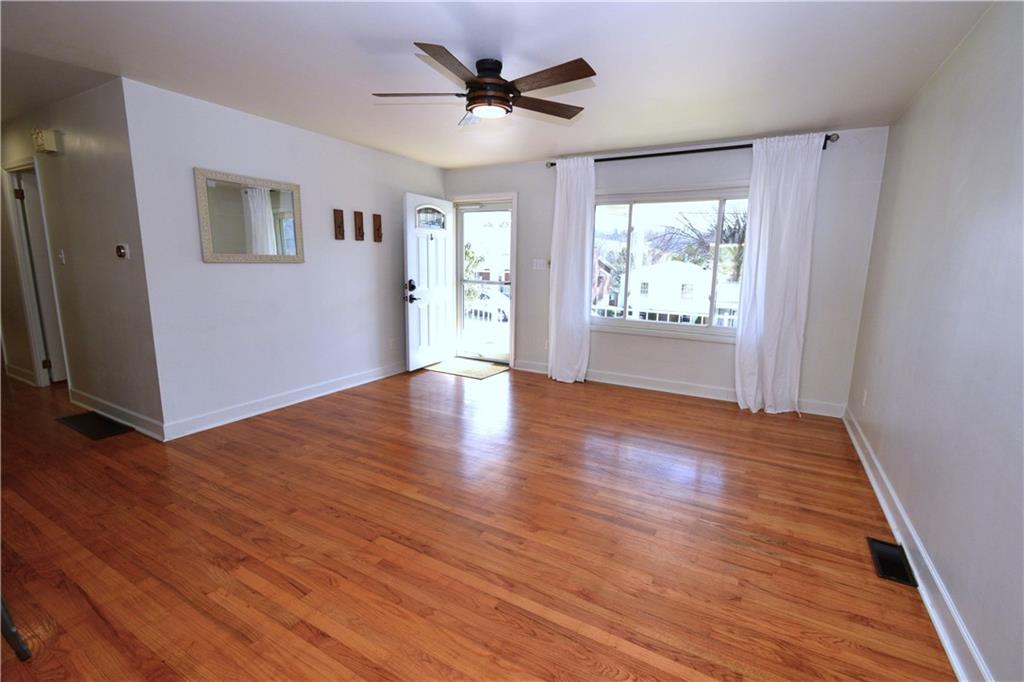 57 Old York Road Washington, PA 15301 - Photo 10 of 25 an empty room with wooden floor and windows