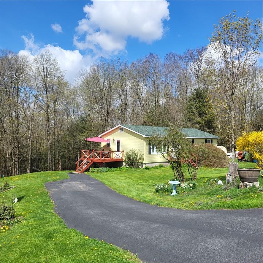 253 Wade Road Liberty, NY 12754 - Photo 1 of 1 a view of a house with a yard and sitting area