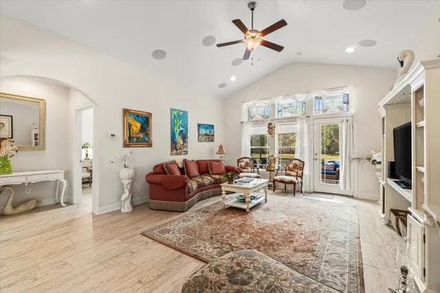 a living room with furniture and a rug