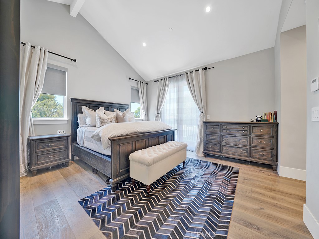 169 22nd Street Costa Mesa, CA 92627 - Photo 14 of 22 a bedroom with furniture and wooden floor