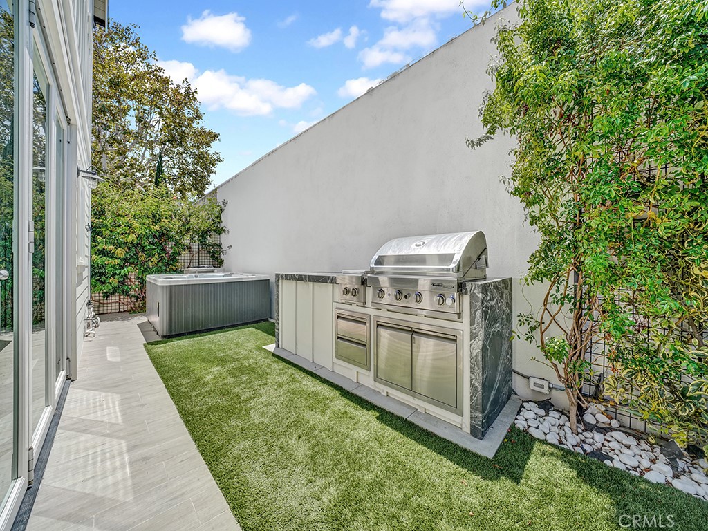 169 22nd Street Costa Mesa, CA 92627 - Photo 18 of 22 a view of a kitchen with a stove