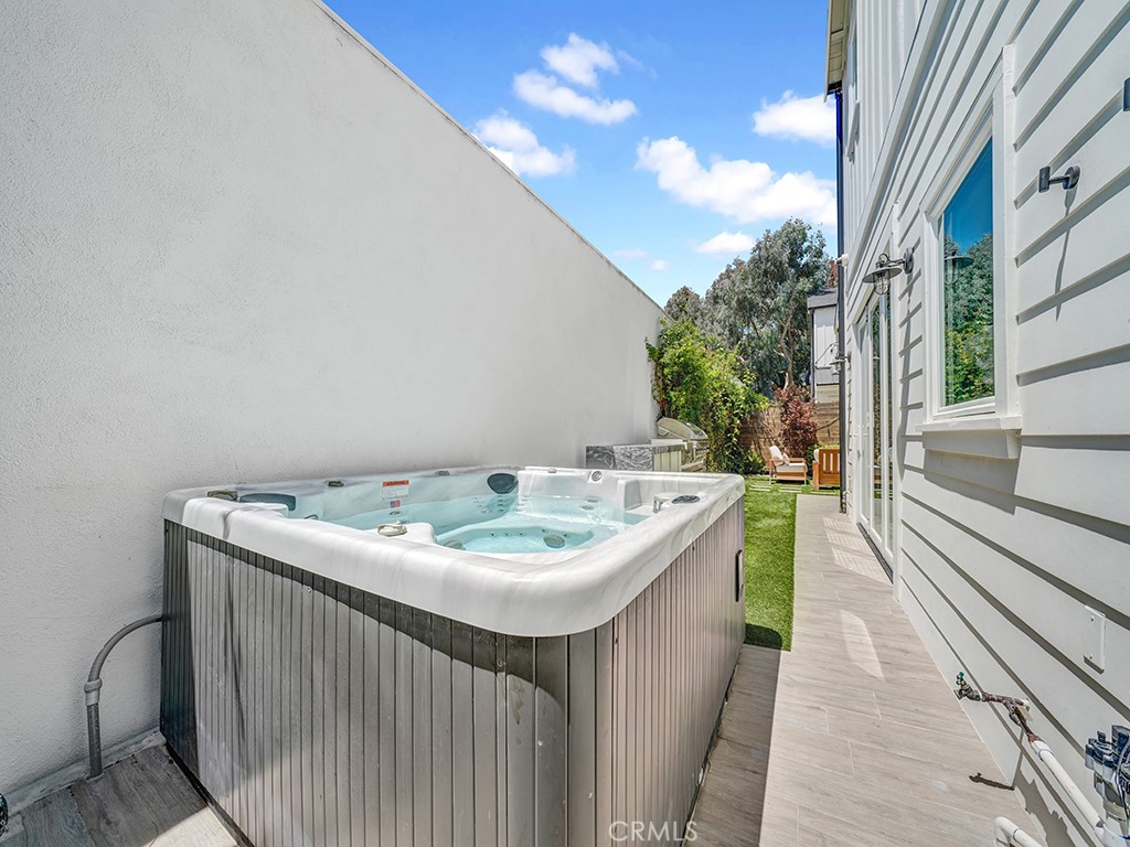 169 22nd Street Costa Mesa, CA 92627 - Photo 19 of 22 a bathroom with a sink and mirror
