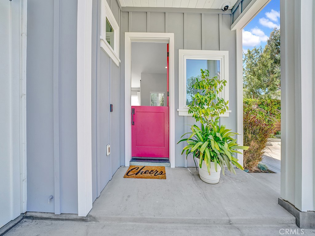 169 22nd Street Costa Mesa, CA 92627 - Photo 20 of 22 a potted plant sitting in front of a glass door
