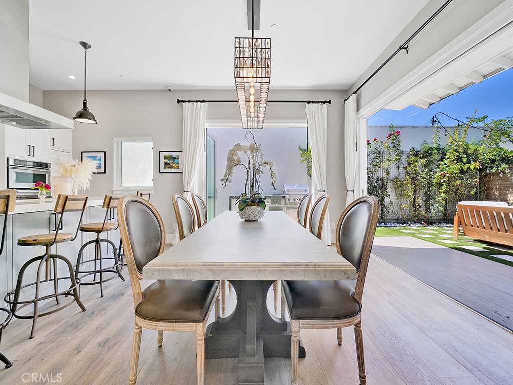 169 22nd Street Costa Mesa, CA 92627 - Photo 5 of 22 a view of a a dining room with furniture window and wooden floor