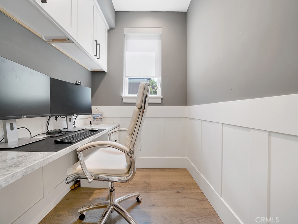 169 22nd Street Costa Mesa, CA 92627 - Photo 8 of 22 a view of a workspace with furniture