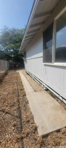 a view of a house with a yard and garage