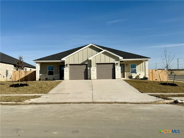 a view of a house with a patio