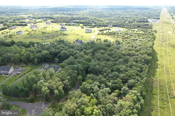 a view of a field with an outdoor space