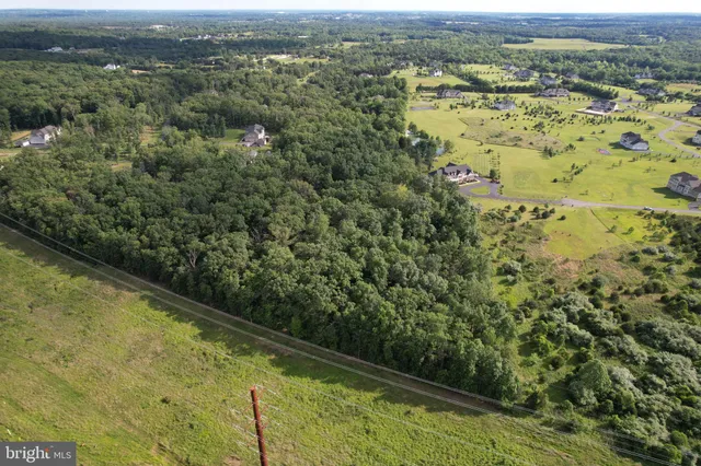 a view of a water with a yard