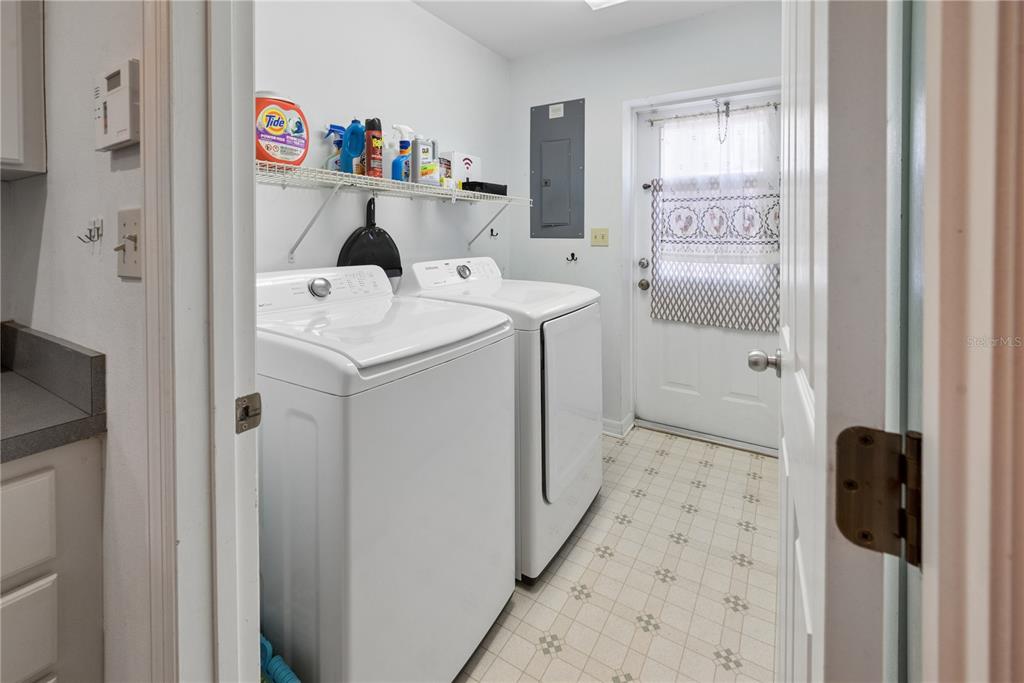 1750 Southwest 15th Street Bell, FL 32619 - Photo 23 of 34 a utility room with dryer and washer