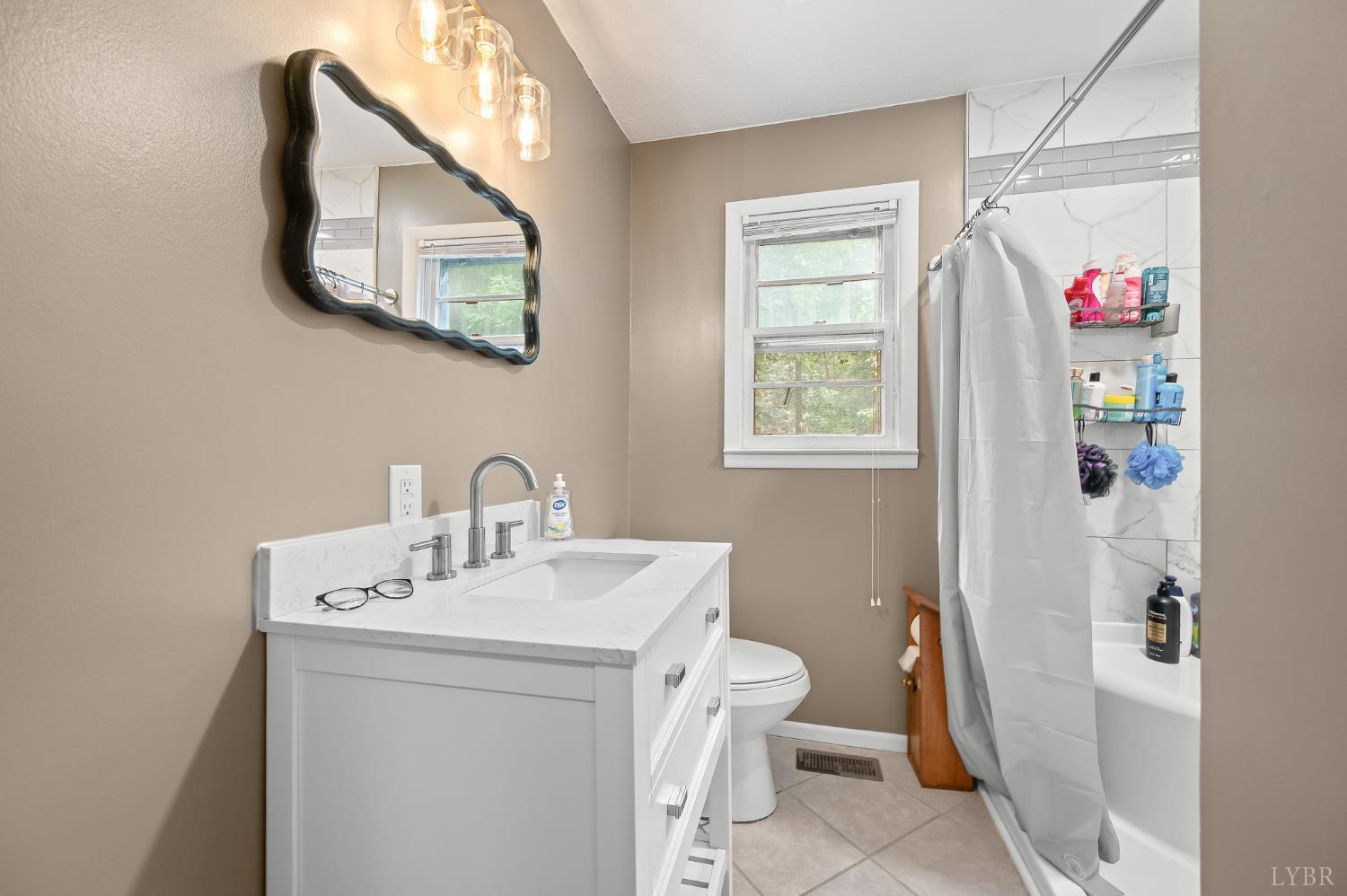 969 Hawkins Road Evington, VA 24550 - Photo 18 of 40 Hall bathroom was renovated 8 months ago. Original copper plumbing had leaks; so everything was changed over to pex