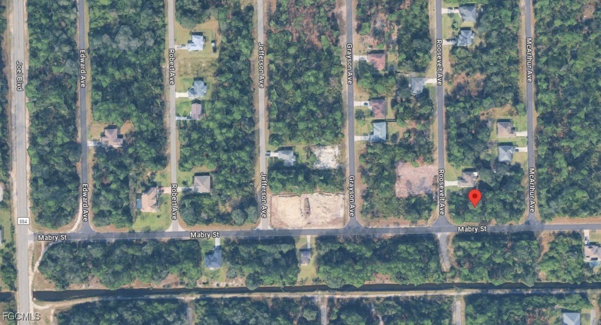 2000 Roosevelt Avenue Alva, FL 33920 - Photo 2 of 2 a view of a city from a balcony