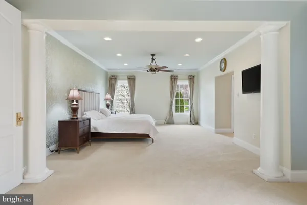 a bedroom with a bed and a closet