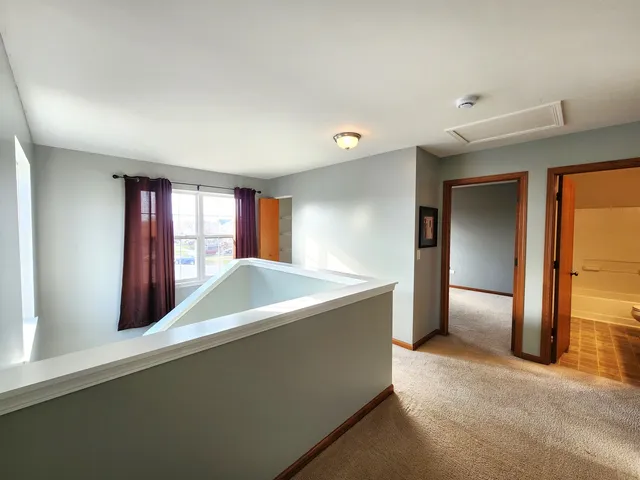 a view of an empty room and window