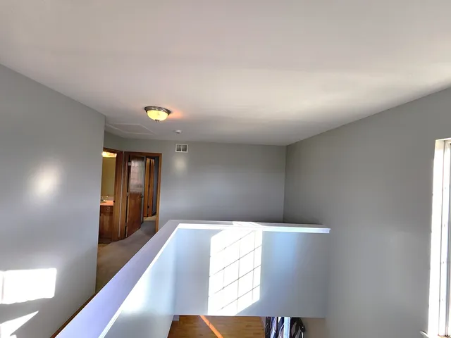 an empty room with windows