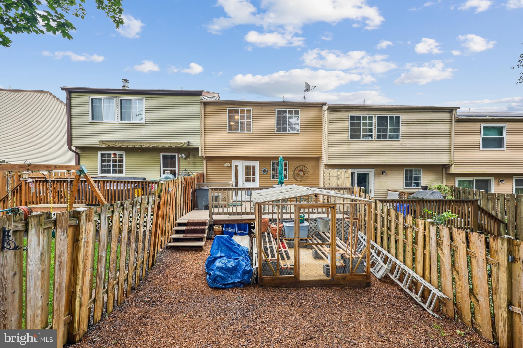25510 Coltrane Drive Damascus, MD 20872 - Photo 22 of 50 a view of a house with wooden fence