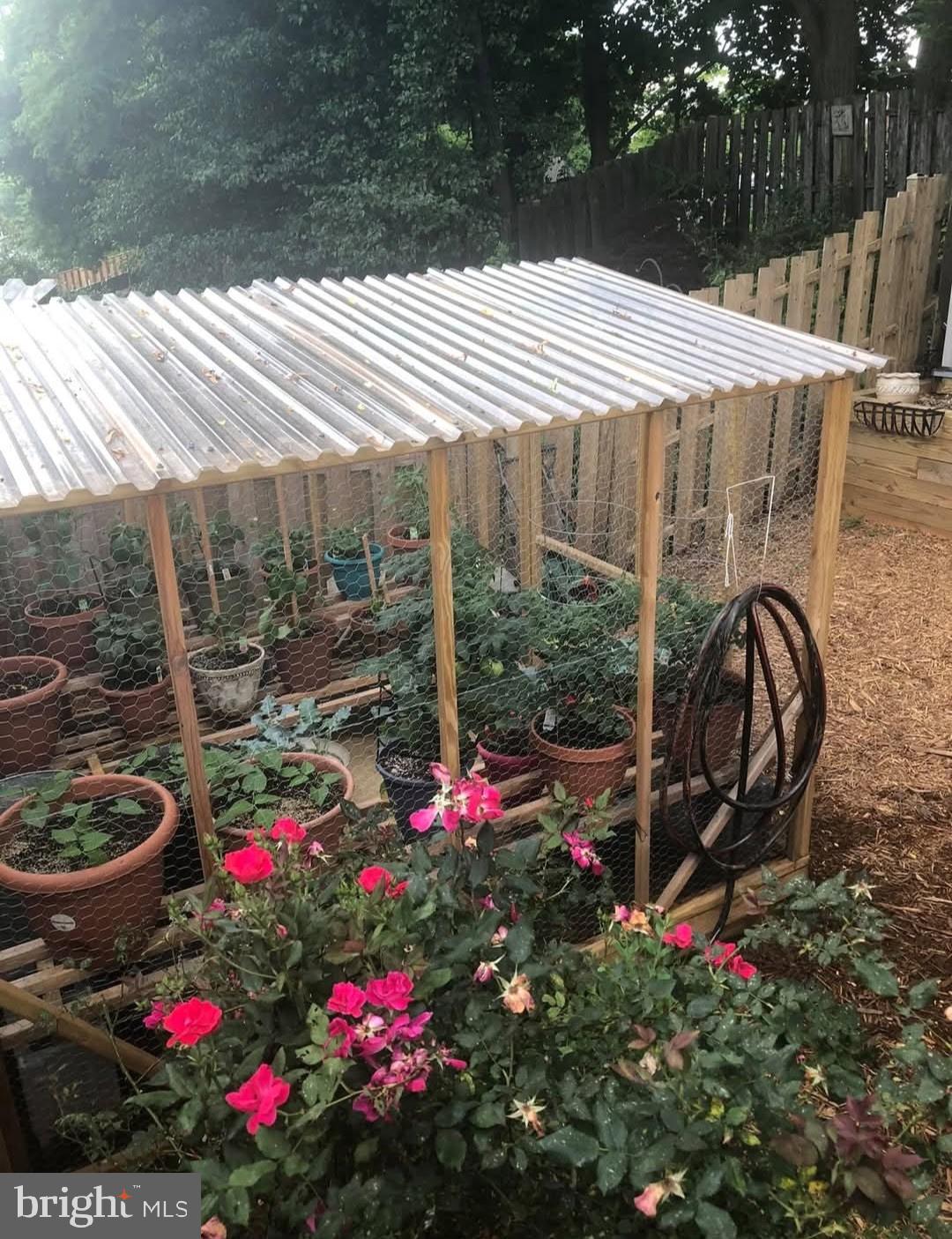 25510 Coltrane Drive Damascus, MD 20872 - Photo 24 of 50 a view of a backyard with sitting area