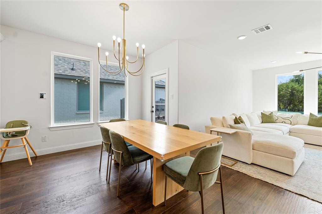 5244 Ranchero Trail Fort Worth, TX 76126 - Photo 11 of 33 Dining space featuring a chandelier, dark wood-type flooring, and recessed lighting