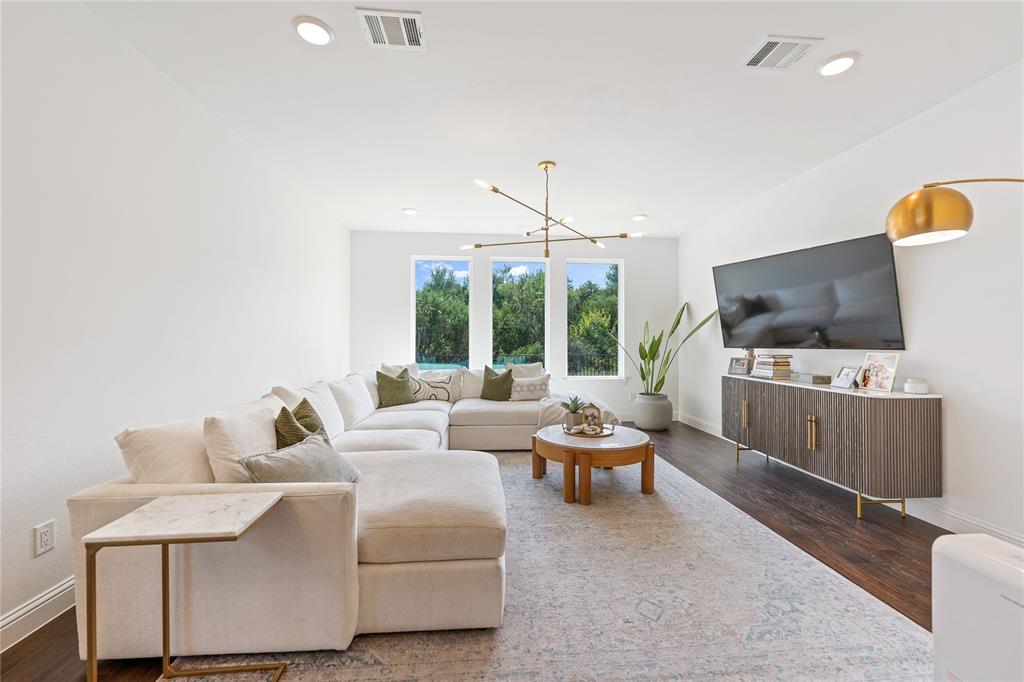 5244 Ranchero Trail Fort Worth, TX 76126 - Photo 13 of 33 Living area with dark wood-style floors, a chandelier, and recessed lighting