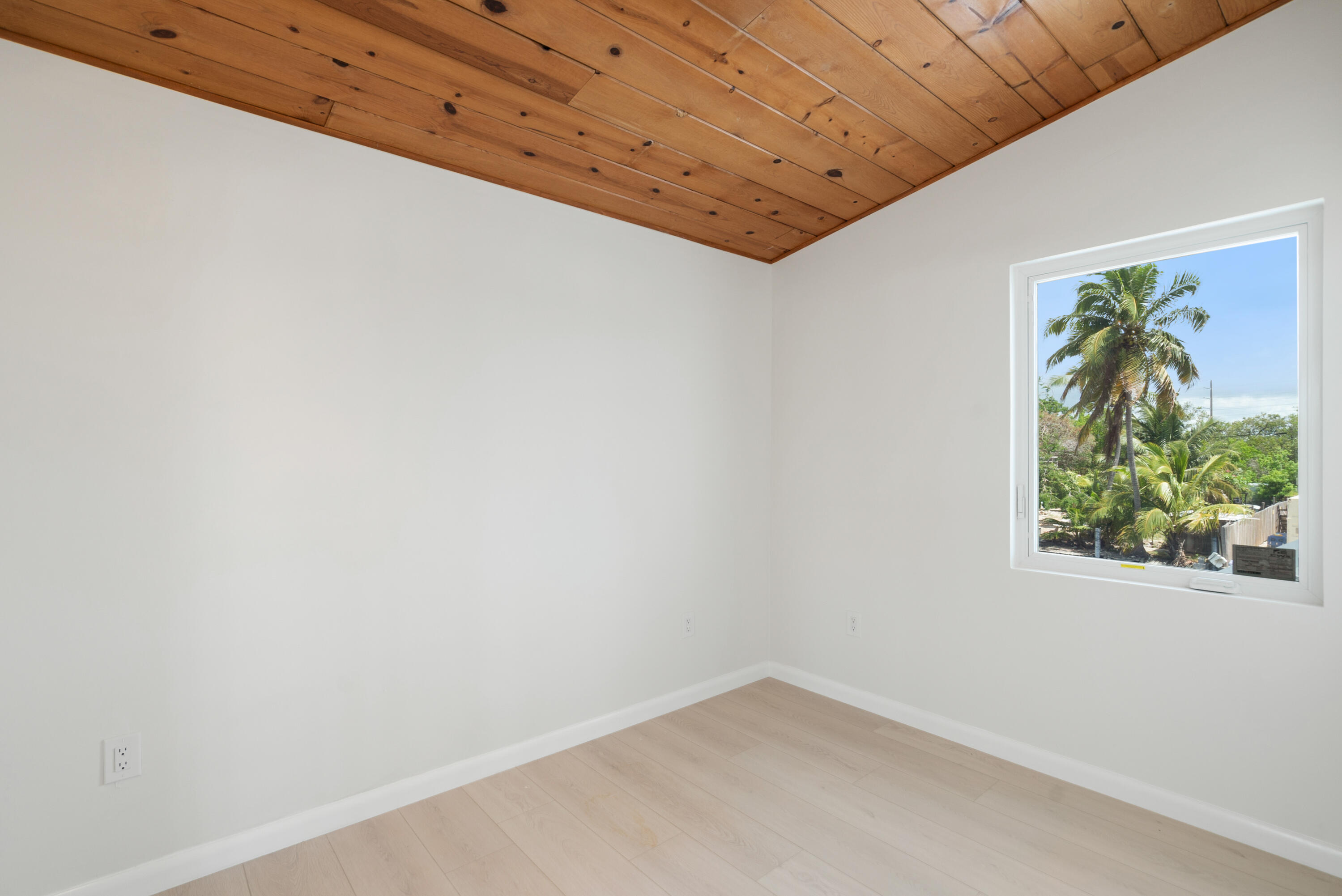 415 Big Pine Road Key Largo, FL 33037 - Photo 16 of 35 a view of a hallway with window